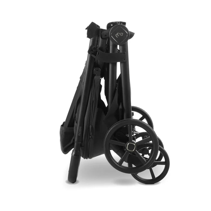 Black folding stroller on a white background