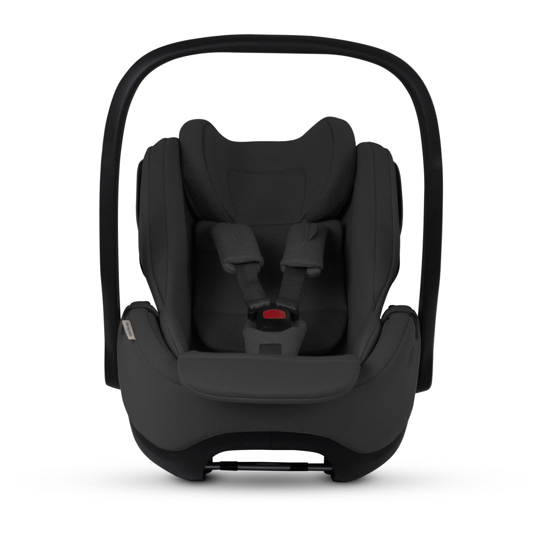 A black Silver Cross Plus i-Size Car Seat, a Red Dot award winner for 2025, designed for children from birth up to 19.5 kg, with dual functionality and a unique inner seat recline system.