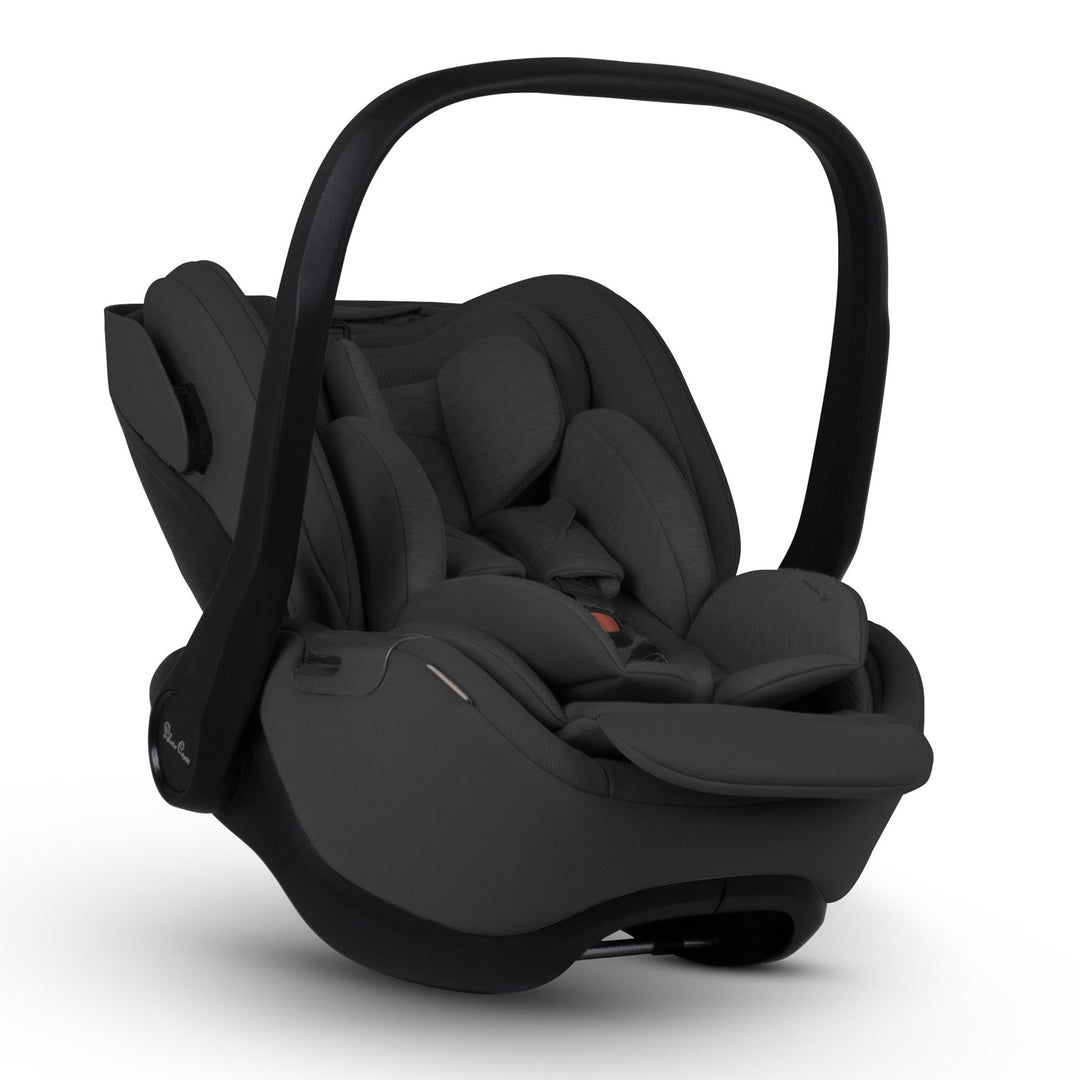 A black Silver Cross Plus i-Size Car Seat, designed for children from birth up to 19.5 kg, with dual functionality and a unique inner seat recline system.