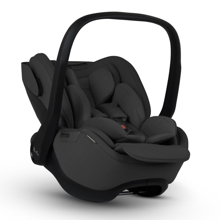 A black Silver Cross Plus i-Size Car Seat, designed for children from birth up to 19.5 kg, with dual functionality and a unique inner seat recline system.