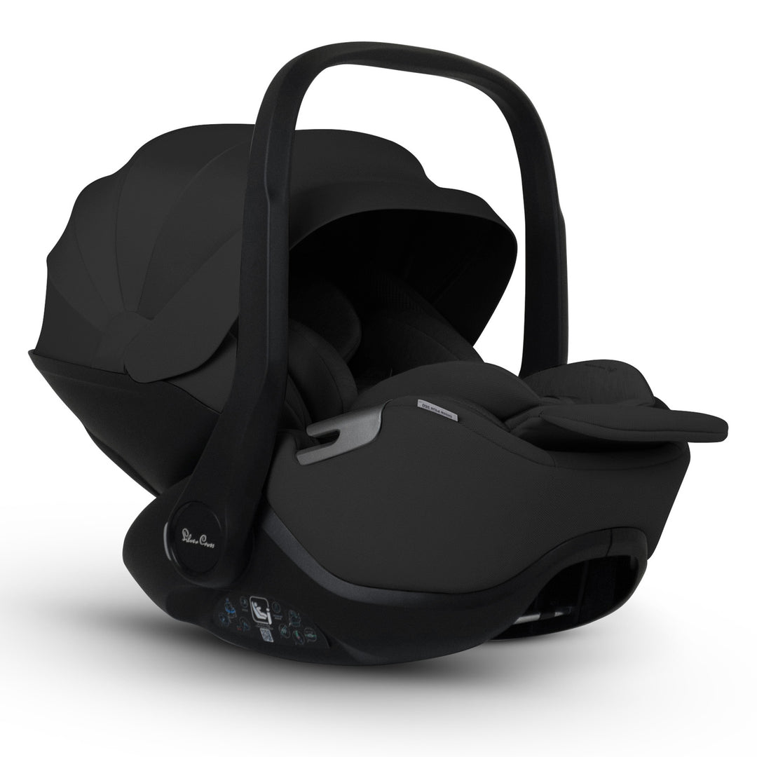 A black Silver Cross Plus i-Size Car Seat, a Red Dot award winner for 2025, designed for children from birth up to 19.5 kg, with dual functionality and a unique inner seat recline system.