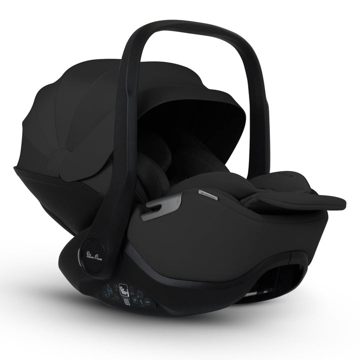 A black Silver Cross Plus i-Size Car Seat, a Red Dot award winner for 2025, designed for children from birth up to 19.5 kg, with dual functionality and a unique inner seat recline system.