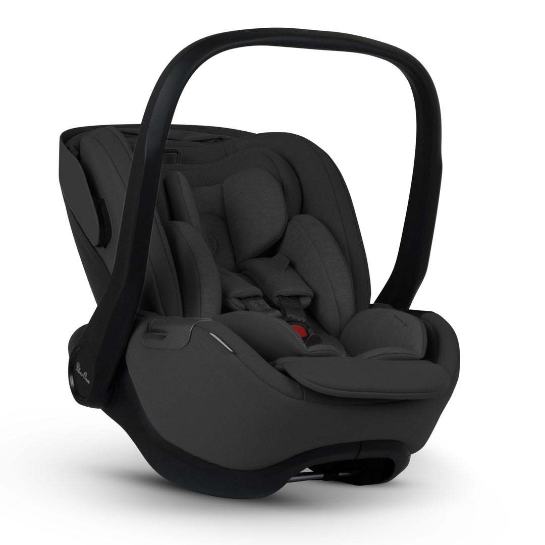 A black Silver Cross Plus i-Size Car Seat, a Red Dot award winner for 2025, designed for children from birth up to 19.5 kg, with dual functionality and a unique inner seat recline system.