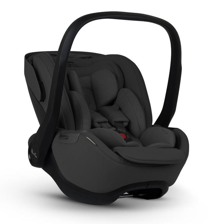 A black Silver Cross Plus i-Size Car Seat, a Red Dot award winner for 2025, designed for children from birth up to 19.5 kg, with dual functionality and a unique inner seat recline system.