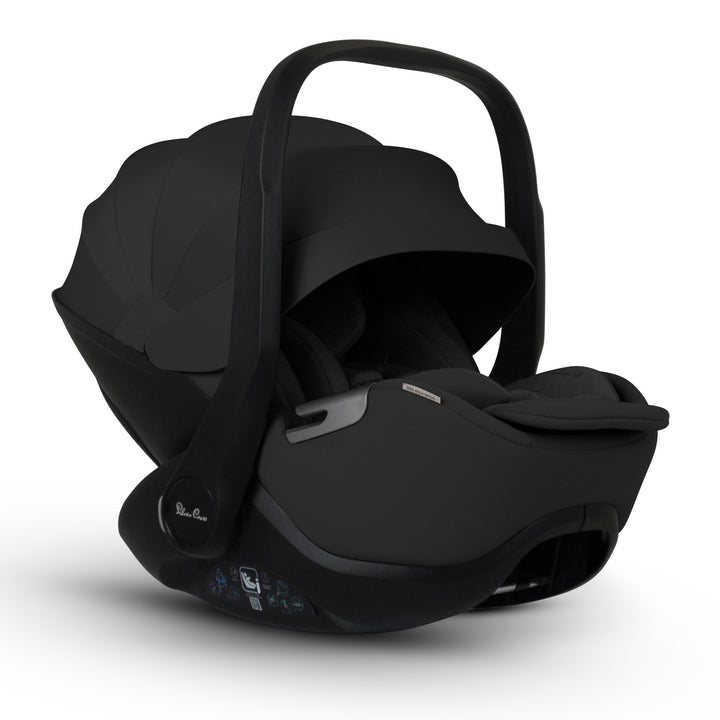 A black Silver Cross Plus i-Size Car Seat, a Red Dot award winner for 2025, designed for children from birth up to 19.5 kg, with dual functionality and a unique inner seat recline system.