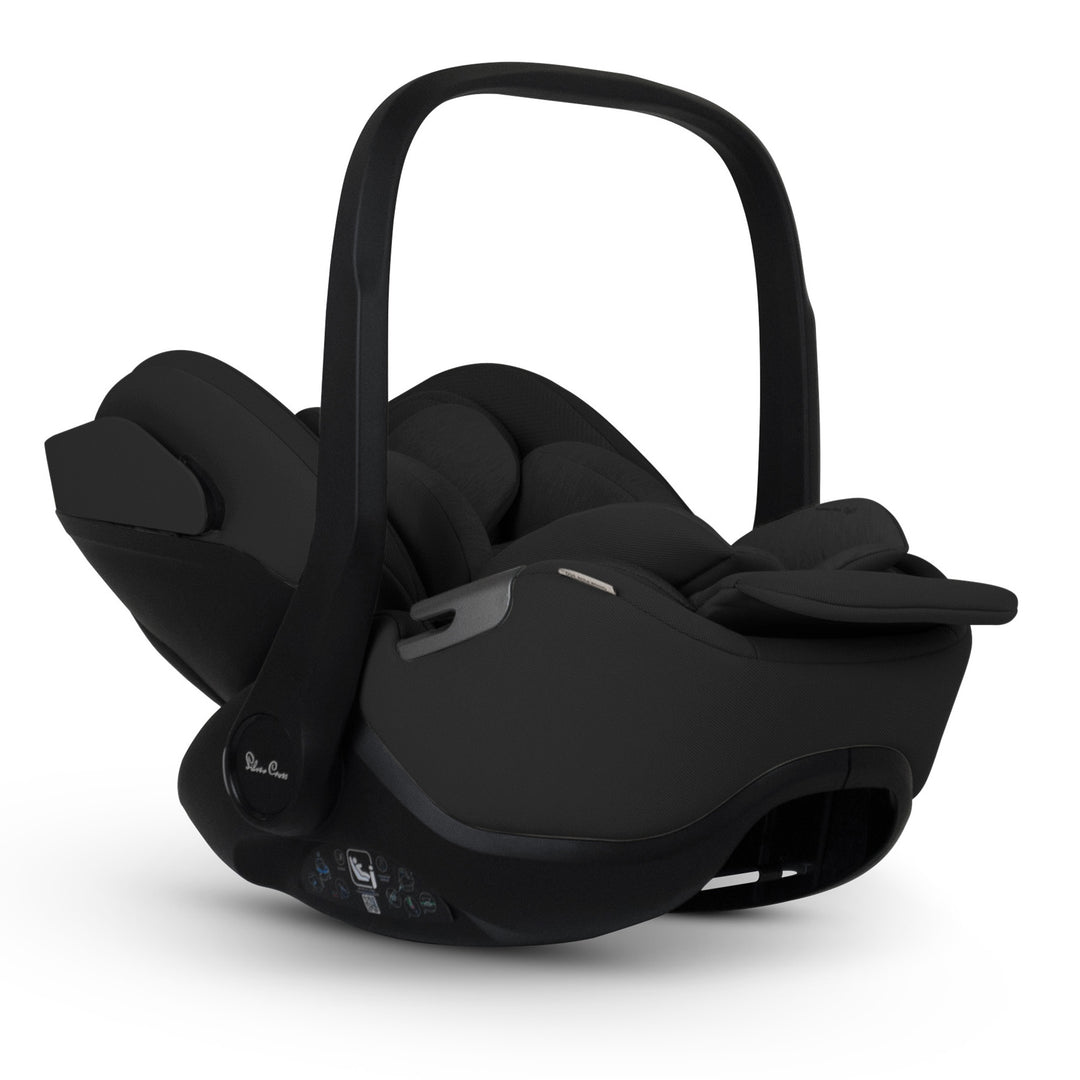 A black Silver Cross Plus i-Size Car Seat, a Red Dot award winner for 2025, designed for children from birth up to 19.5 kg, with dual functionality and a unique inner seat recline system.