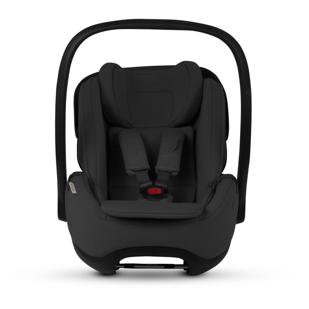 A black Silver Cross Plus i-Size Car Seat, a Red Dot award winner for 2025, designed for children from birth up to 19.5 kg, with dual functionality and a unique inner seat recline system.