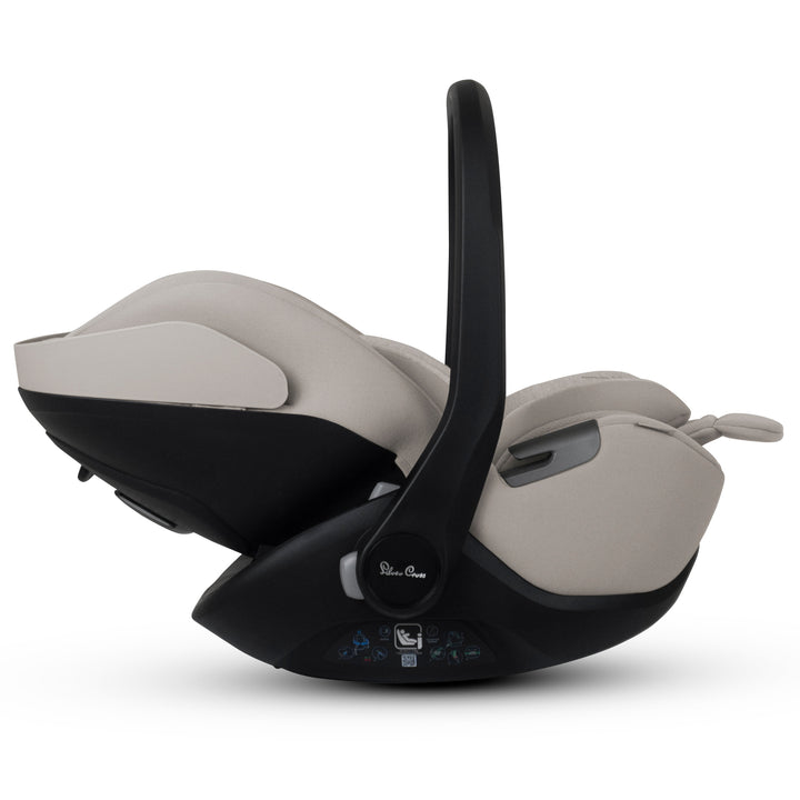 A black Silver Cross Approach Plus i-Size Car Seat, a Red Dot award winner for 2025, designed for children from birth up to 19.5 kg, with dual functionality and a unique inner seat recline system.