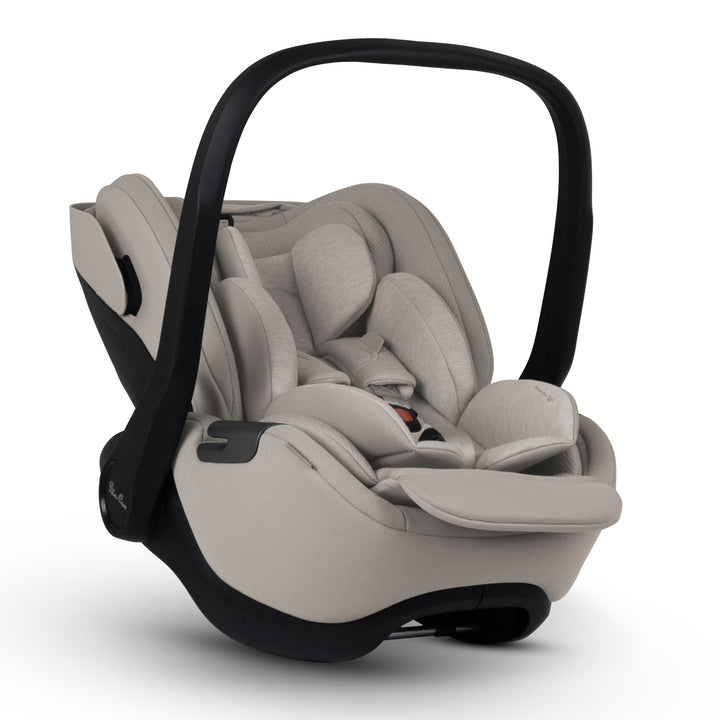 A black Silver Cross Plus i-Size Car Seat, a Red Dot award winner for 2025, designed for children from birth up to 19.5 kg, with dual functionality and a unique inner seat recline system.