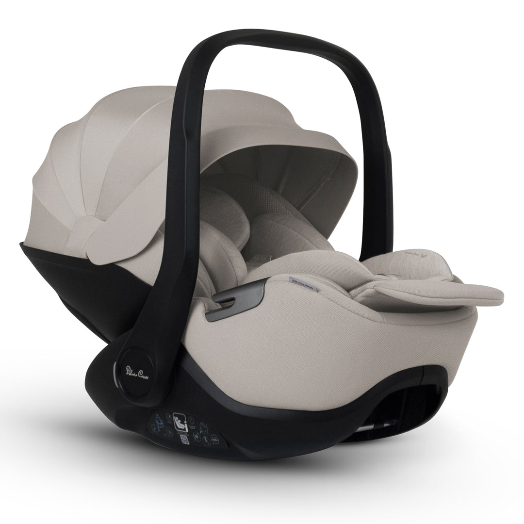 A black Silver Cross Plus i-Size Car Seat, a Red Dot award winner for 2025, designed for children from birth up to 19.5 kg, with dual functionality and a unique inner seat recline system.