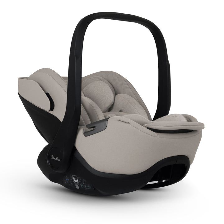 A black Silver Cross Plus i-Size Car Seat, a Red Dot award winner for 2025, designed for children from birth up to 19.5 kg, with dual functionality and a unique inner seat recline system.