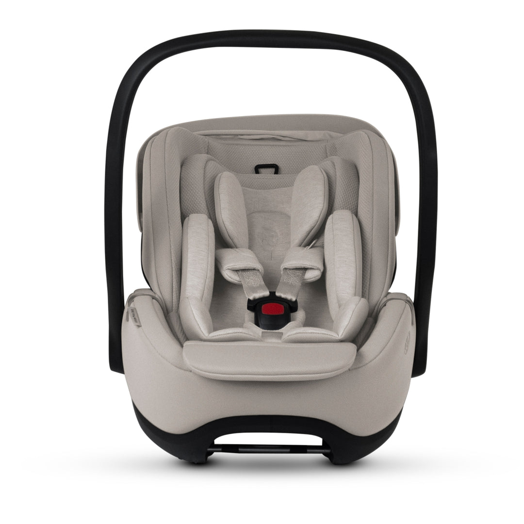 A black Silver Cross Plus i-Size Car Seat, a Red Dot award winner for 2025, designed for children from birth up to 19.5 kg, with dual functionality and a unique inner seat recline system.