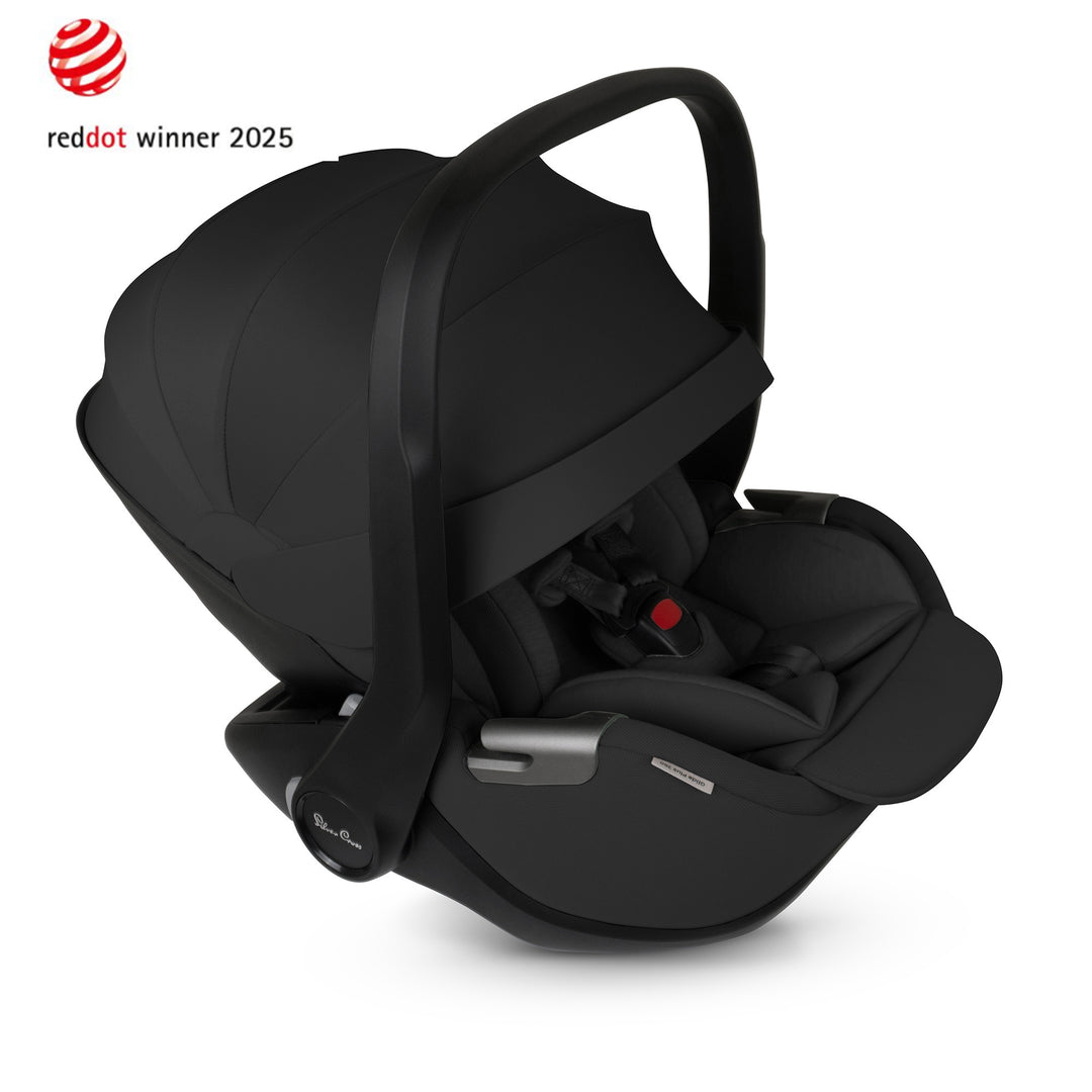 Black Silver Cross Glide Plus 360 i-Size Car Seat for newborns, with a 5-position headrest and bamboo insert, recognized with a 2025 Red Dot award for design excellence.