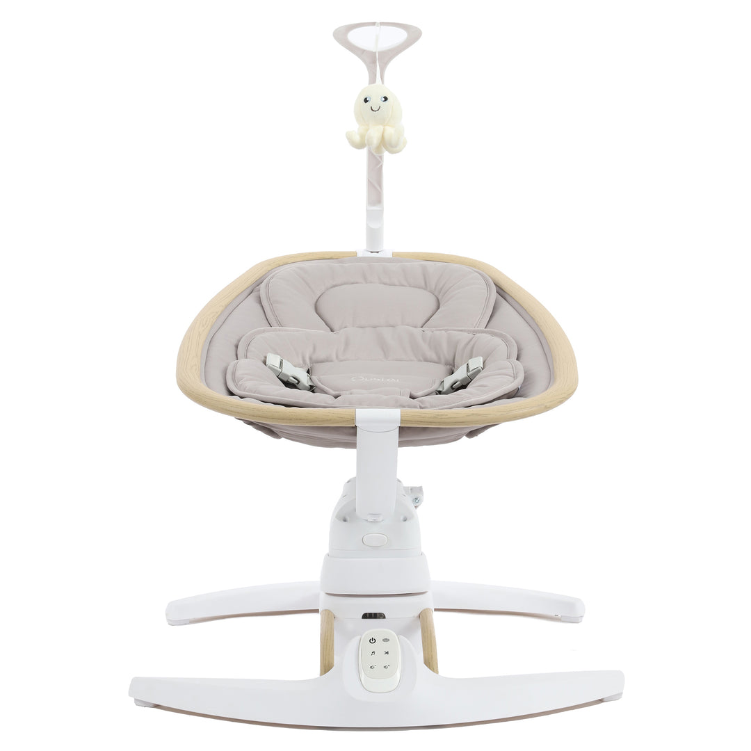 Baby swing with beige cushion and white base on a white background