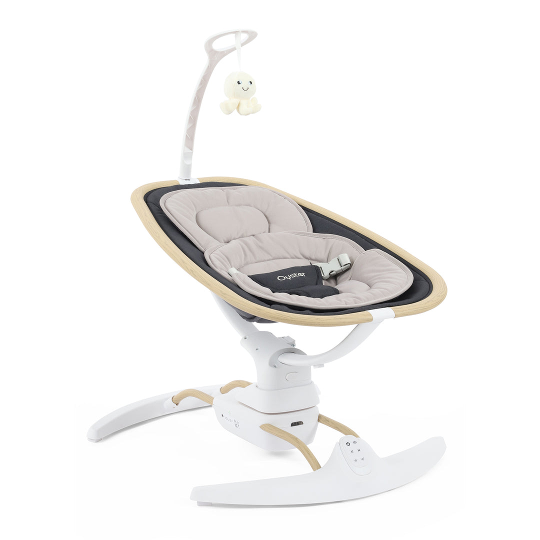 Baby swing with beige and white design on a white background