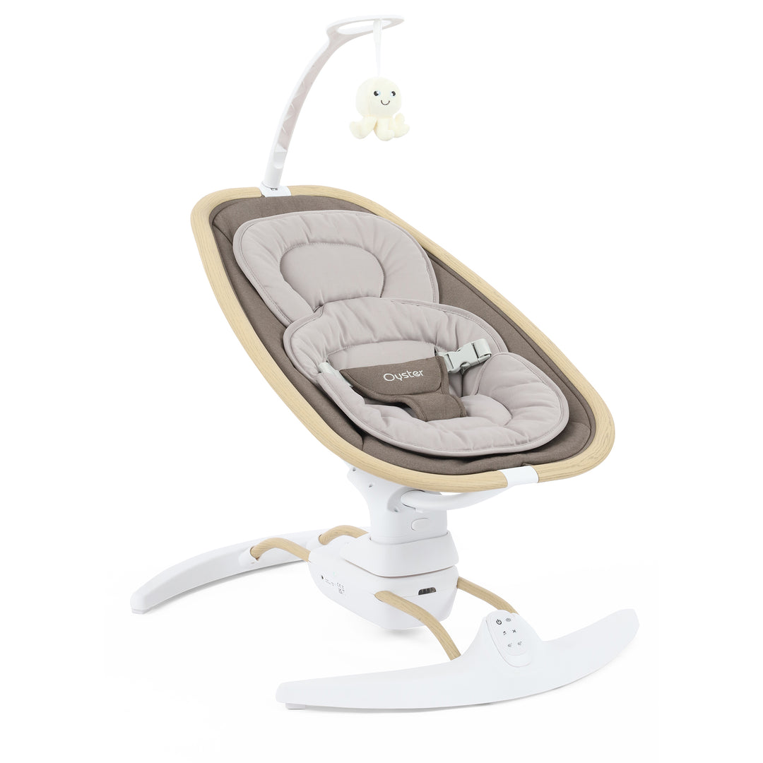 Baby swing with beige and gray cushion on a white background