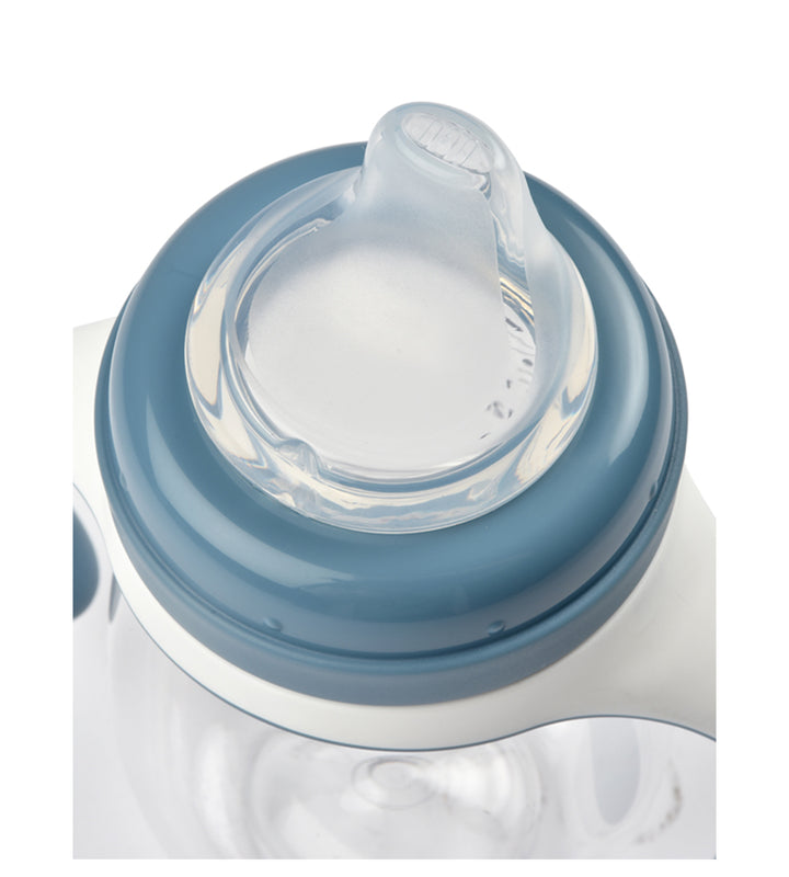 Close-up of a baby bottle with a blue cap on a white background
