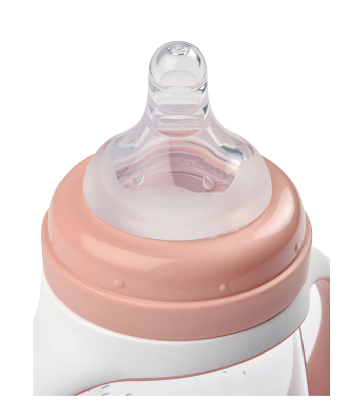 Close-up of a baby bottle with a pink cap on a white background