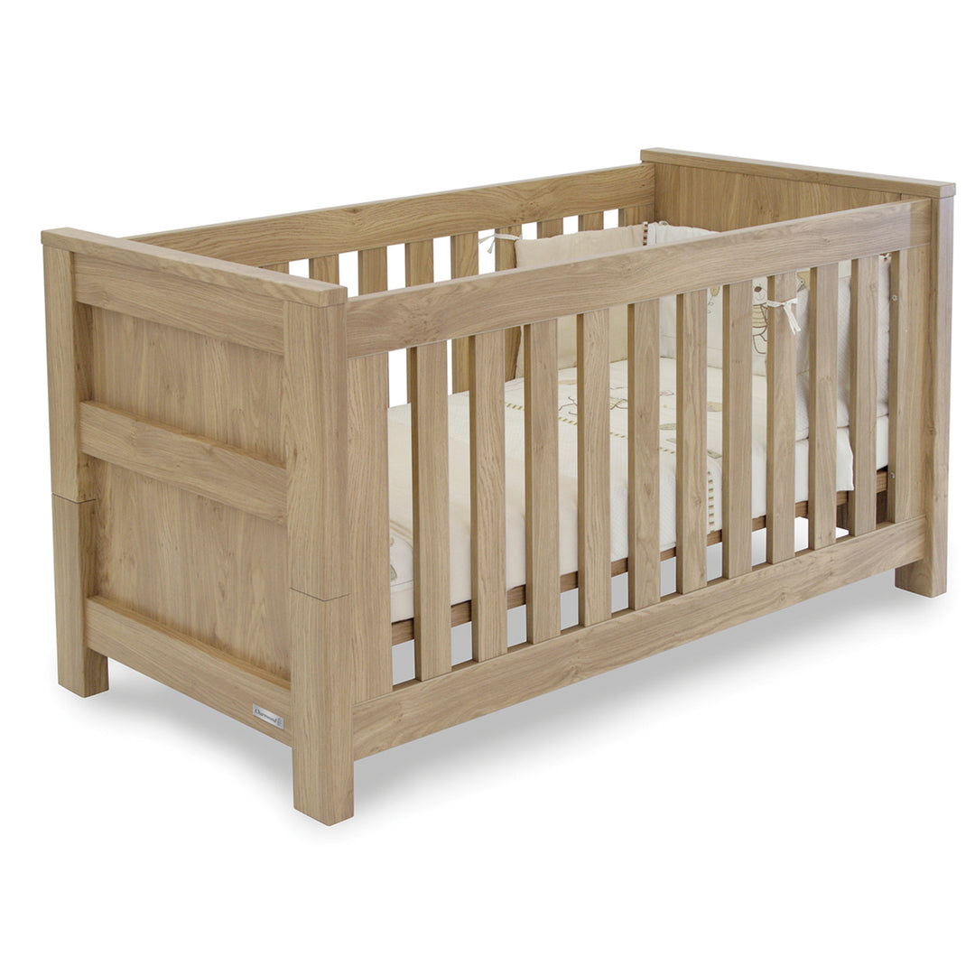 Wooden crib on a white background