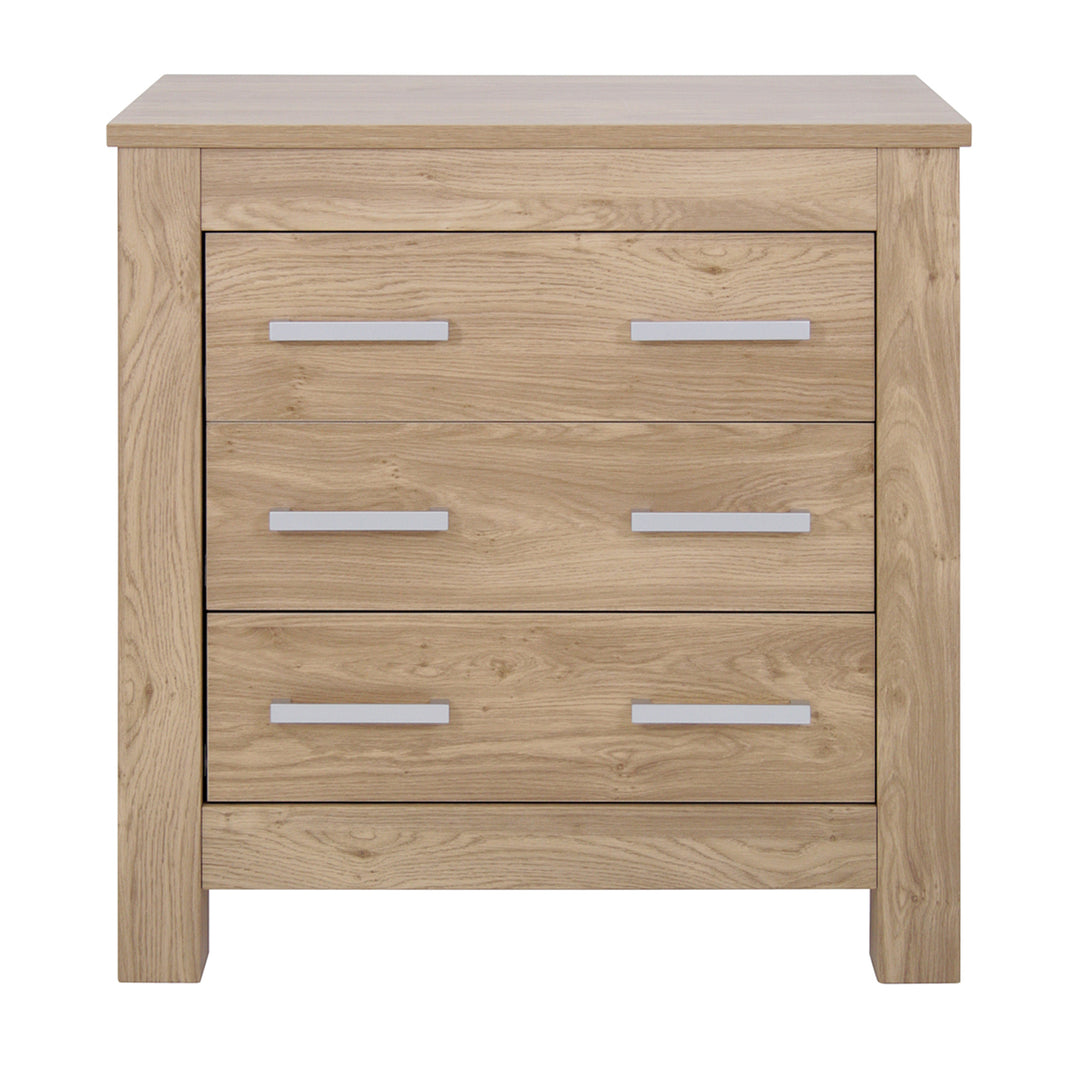 Wooden dresser with three drawers and metal handles on a white background
