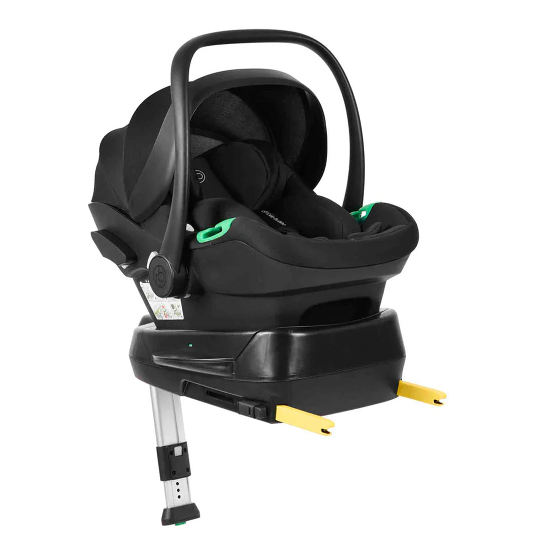 Black baby car seat with base on a white background