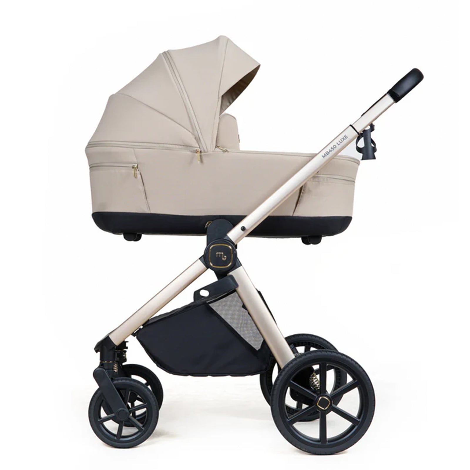 Beige and black baby stroller on a white background