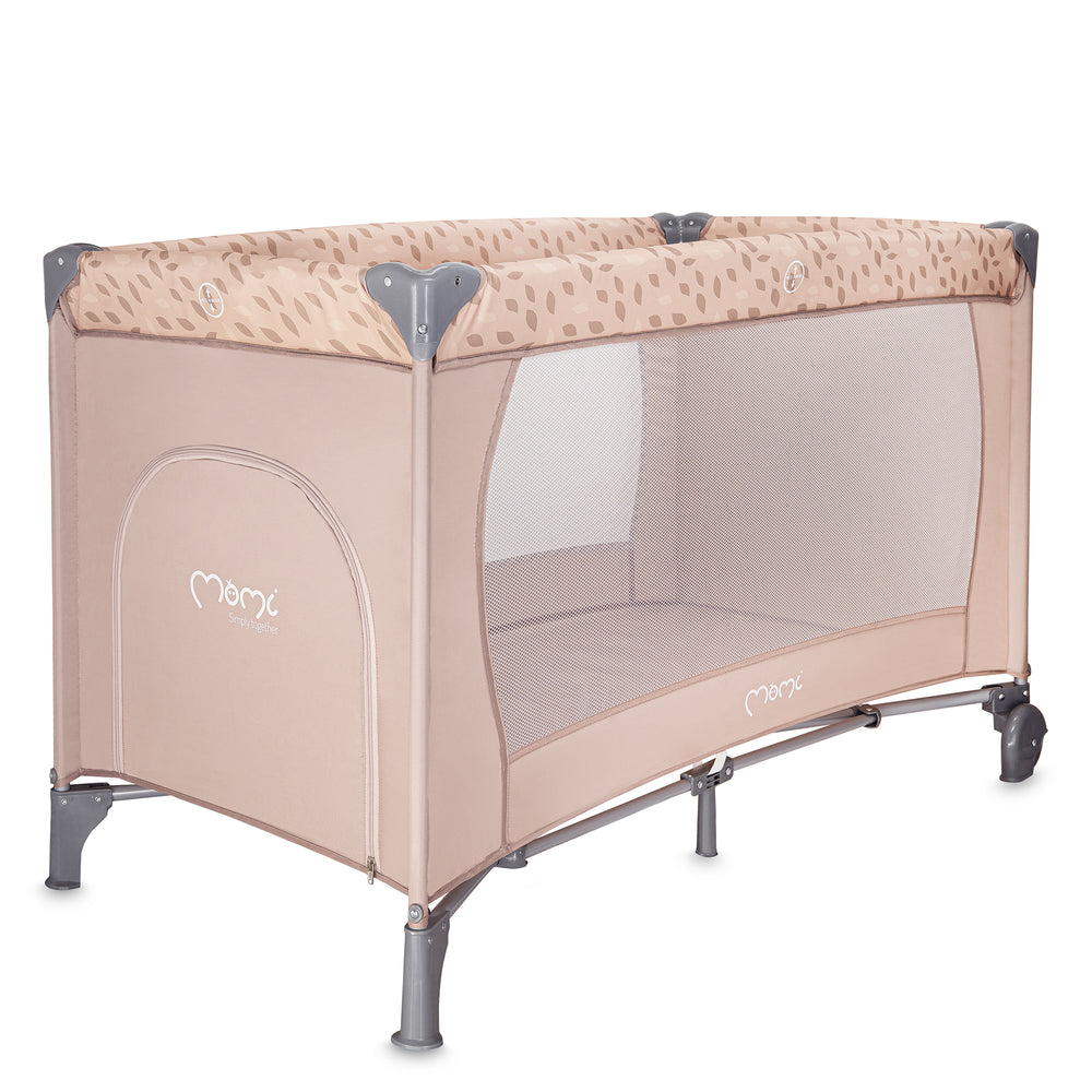 Beige baby travel crib with patterned top on a white background