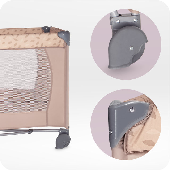 Baby crib with close-up of wheels on a white background