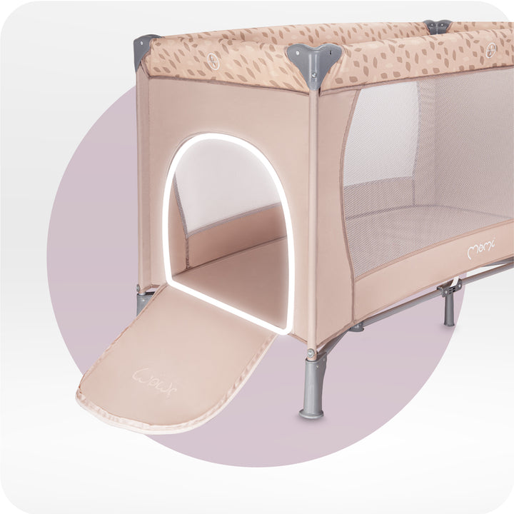 Beige baby crib with a slide on a light purple background