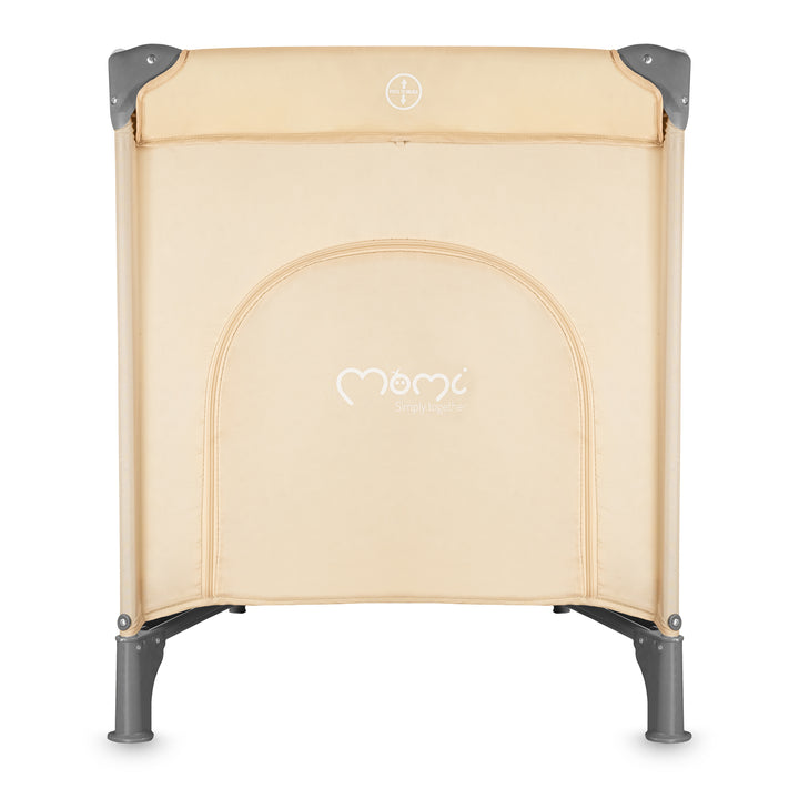 Beige baby crib with gray legs on a white background