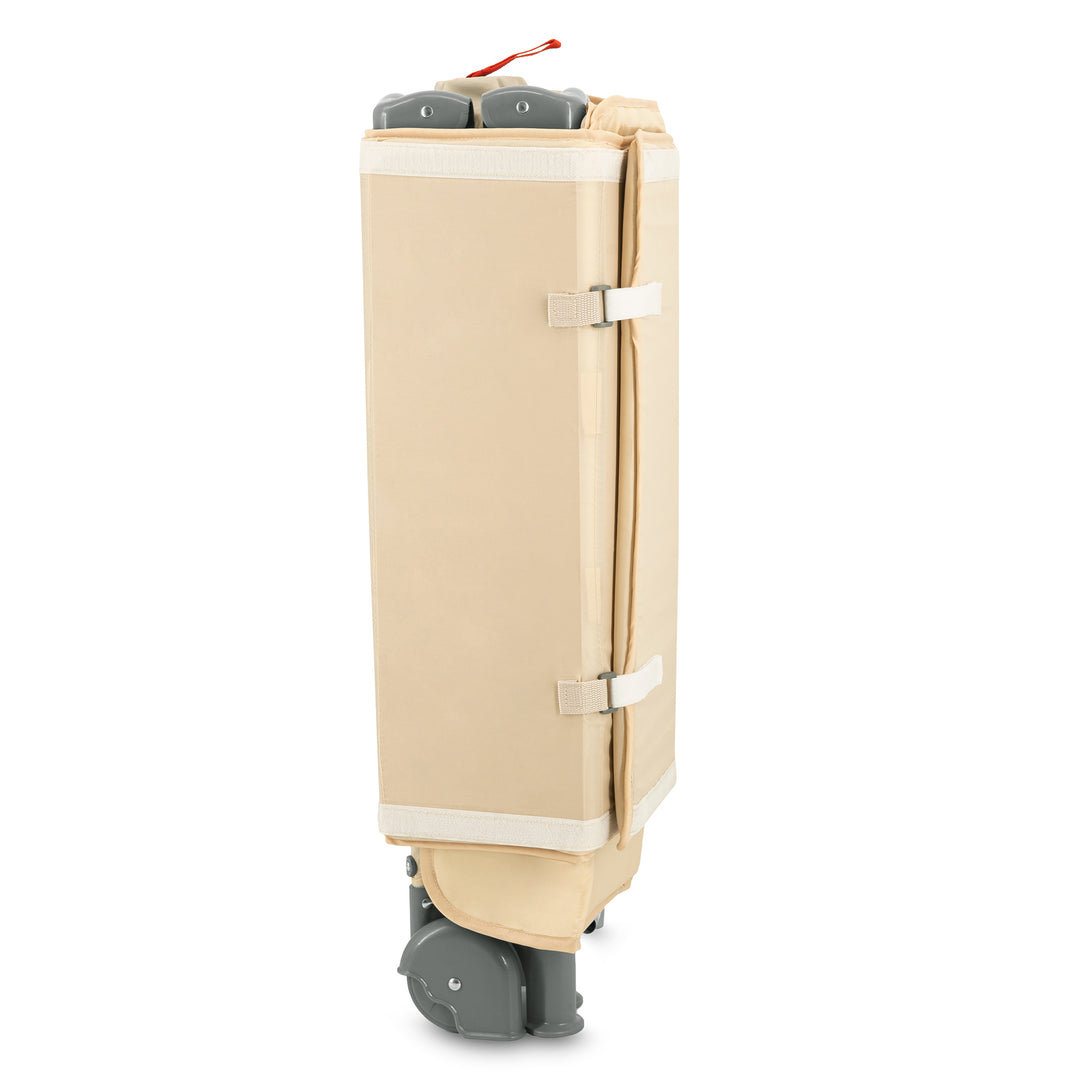 Beige suitcase with wheels on a white background