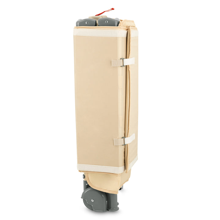 Beige suitcase with wheels on a white background