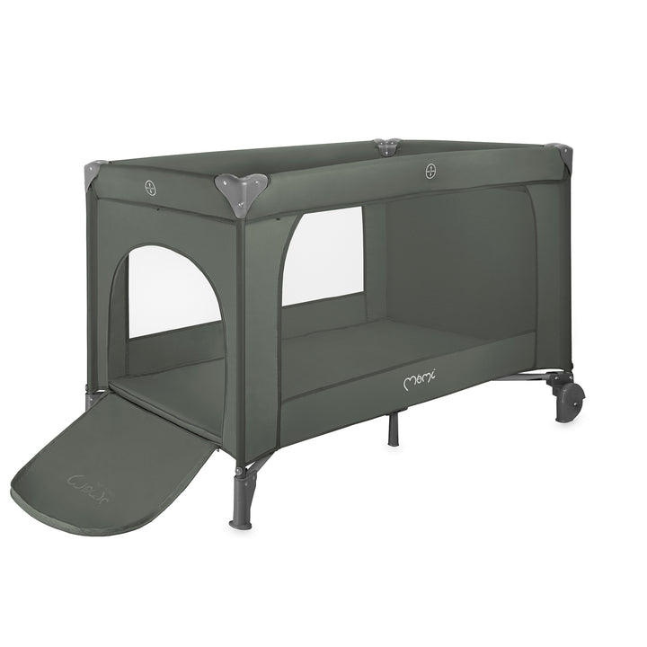 Green travel crib with a folded-out side panel on a white background