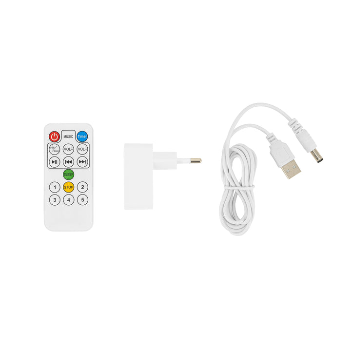 White remote control, power adapter, and USB cable on a white background