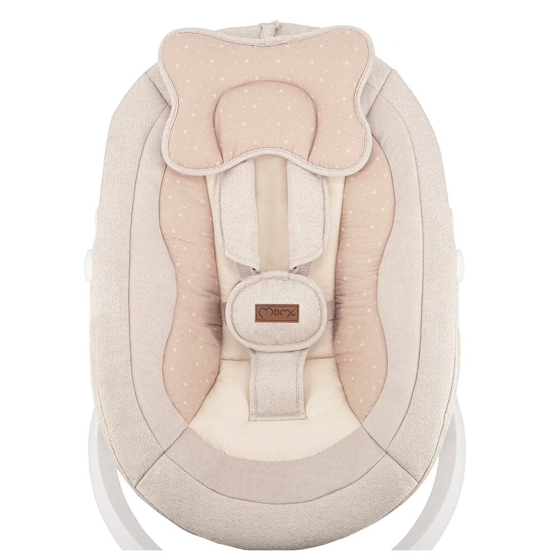 Baby swing with pink and beige design on a white background