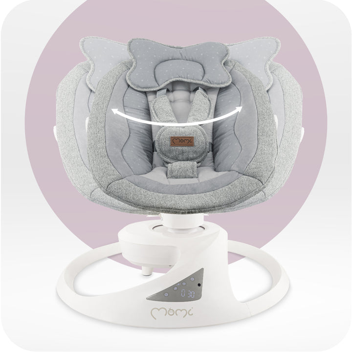 Gray baby swing with white base on a light purple background