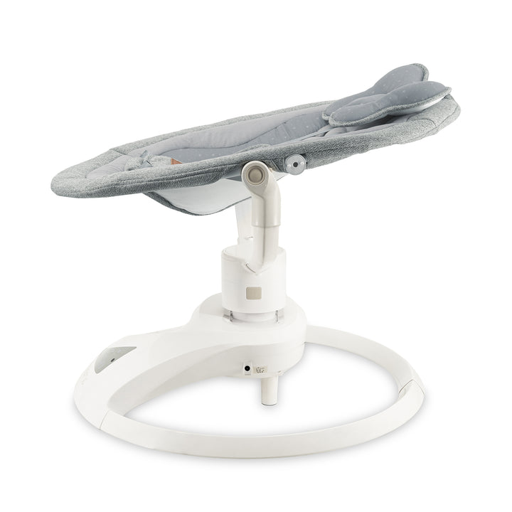 Baby swing with gray seat and white base on a white background