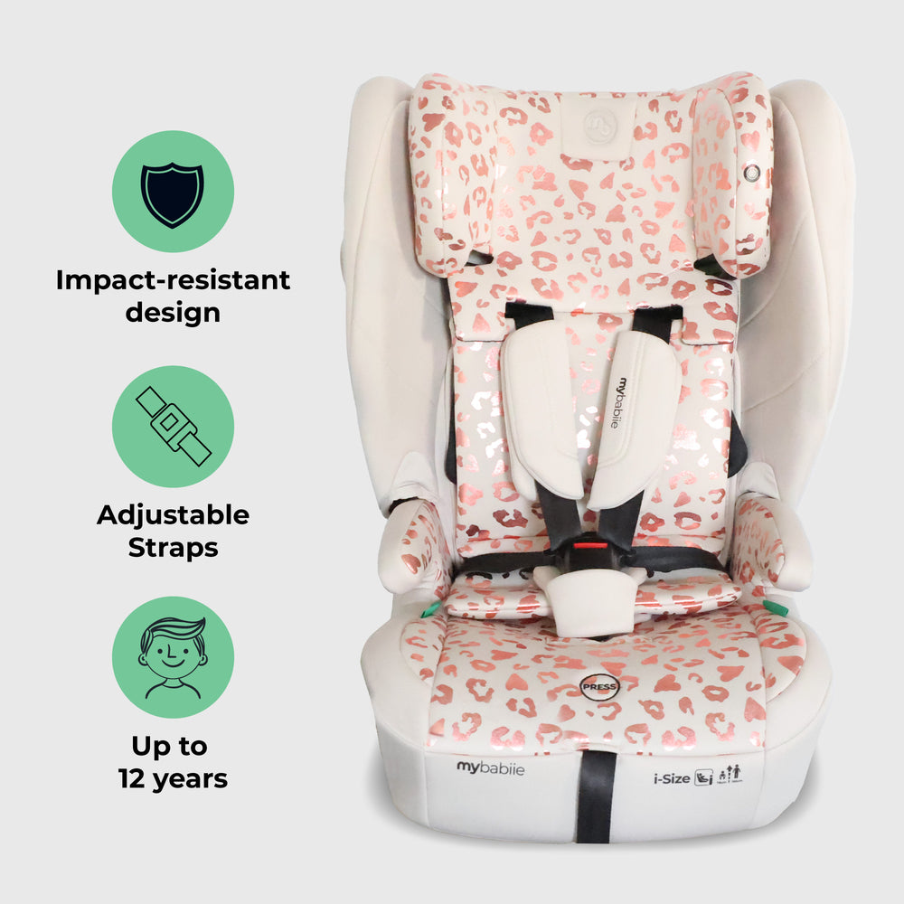 Children's car seat with pink leopard print design on a light gray background