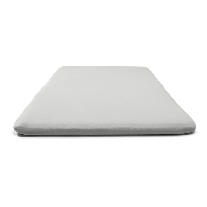 Gray mattress cover on a white background