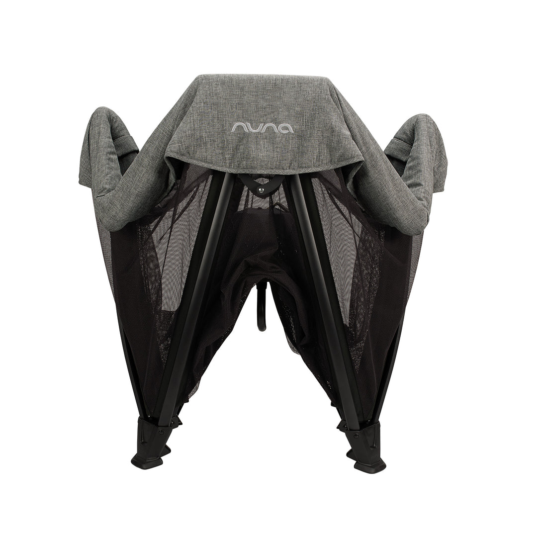 Nuna baby carrier with gray hood on a white background