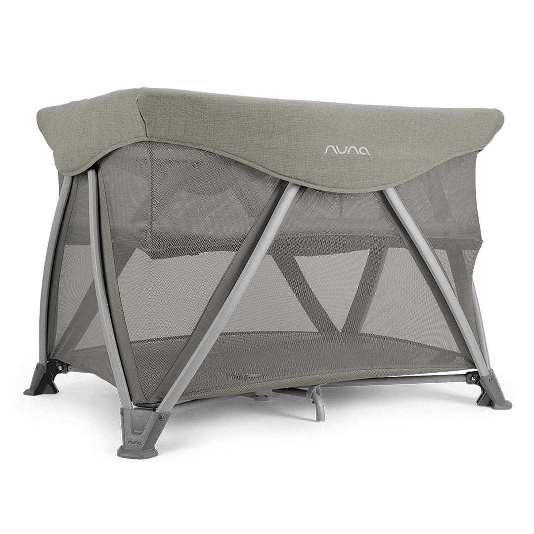 Nuna travel cot on a white background