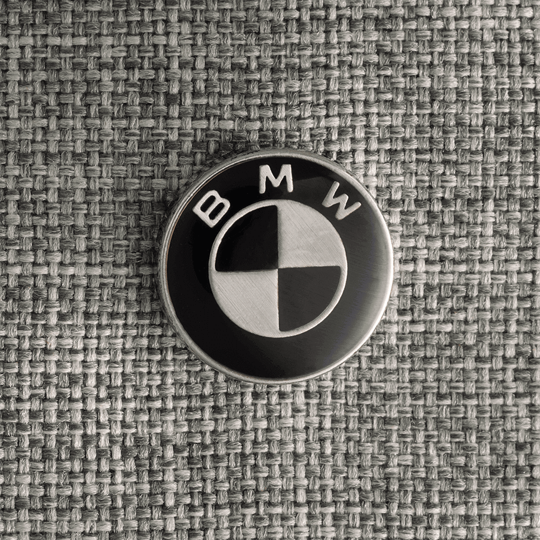 BMW logo on a textured gray background