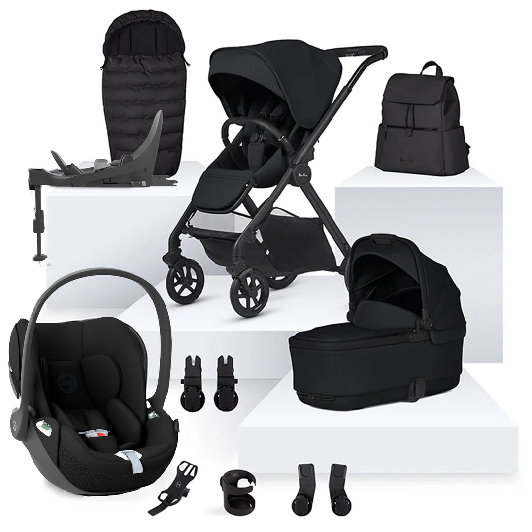 Black baby stroller and car seat set with accessories on a white background