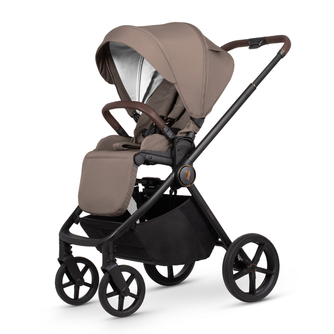 Brown and black stroller on a white background