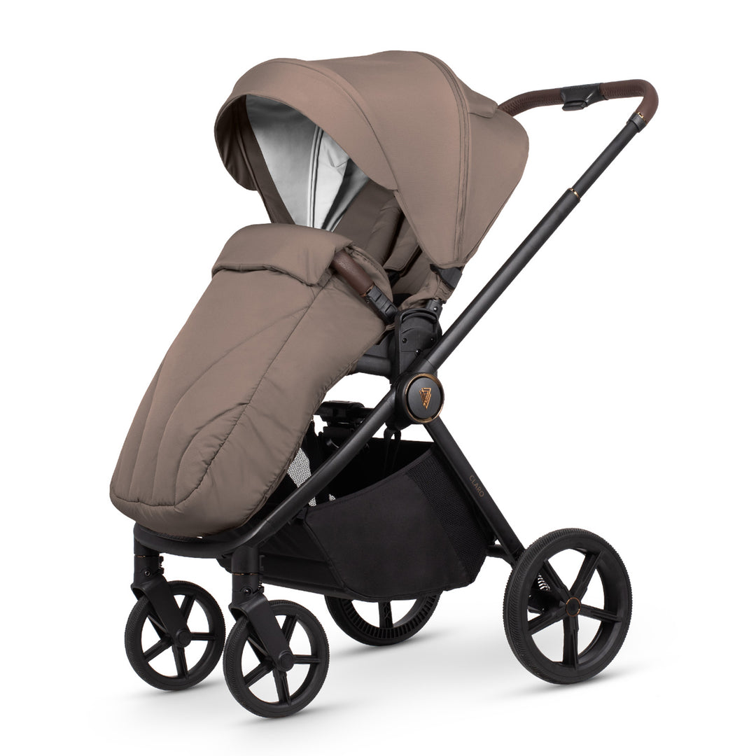 Brown baby stroller with black wheels on a white background